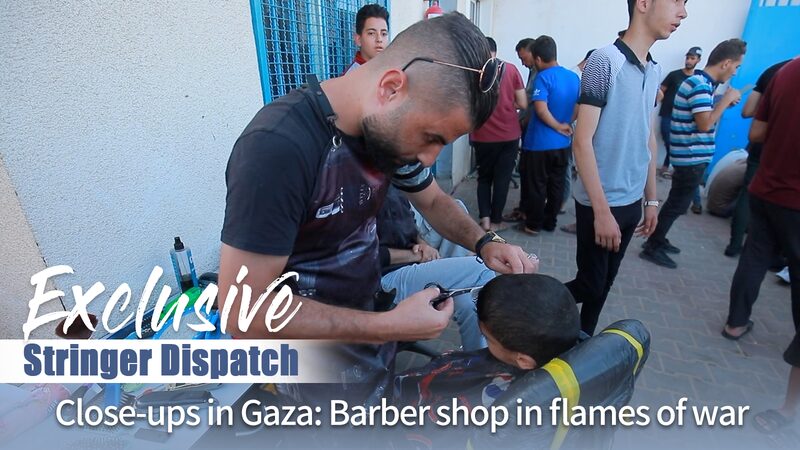 A_Barbers_Resilience_Gazas_Haircuts_Amid_the_Flames_of_War_poster - Khabar Asia A Barber's Resilience: Gaza's Haircuts Amid the Flames of War video poster