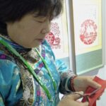 Artisan_s_Swift_Paper_Cutting_Demonstration_Highlights_China_s_Fengning_Manchu_Craft video poster