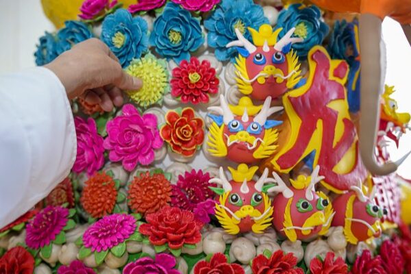 Artist Crafts 2-Meter-High Dragon Dough Sculpture for 2024 Chinese New Year