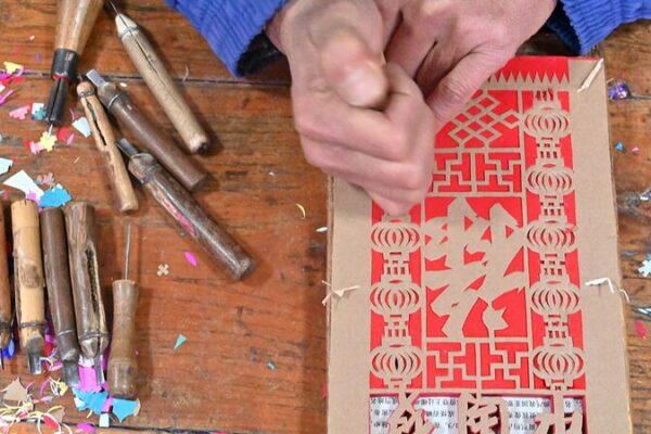 Artistry of ‘Guomenjian’: Shandong’s Vibrant Door Lintel Paper-Cutting Tradition Artistry of 'Guomenjian': Shandong's Vibrant Door Lintel Paper-Cutting Tradition