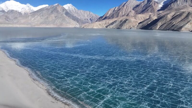 Baisha_Lake__Where_Ice_Meets_Sand_on_the_Pamir_Plateau_poster - Khabar Asia Baisha_Lake__Where_Ice_Meets_Sand_on_the_Pamir_Plateau video poster