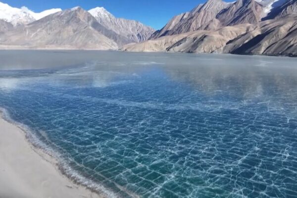 Baisha Lake’s Frozen Beauty: Where Ice Meets Sand in Xinjiang Baisha_Lake_s_Frozen_Beauty__Where_Ice_Meets_Sand_in_Xinjiang video poster