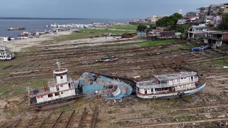 Brazil_s_Amazon_Port_in_Manaus_Hits_Lowest_Water_Level_Since_1902_Amid_Severe_Drought_poster - Khabar Asia Brazil_s_Amazon_Port_in_Manaus_Hits_Lowest_Water_Level_Since_1902_Amid_Severe_Drought video poster