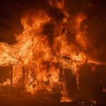 California_Wildfires_Rage_On__Thousands_Evacuated_as_Blazes_Devastate_Los_Angeles_Area