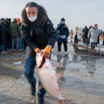 Chagan_Lake_s_Winter_Fishing_Festival_Thrills_Thousands_in_Jilin_Province