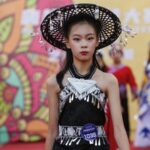 Children Light Up Xinjiang's Qiuci Alley in Duanwu Festival Fashion Show