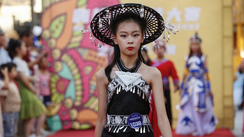 Children_Light_Up_Xinjiangs_Qiuci_Alley_in_Duanwu_Festival_Fashion_Show - Khabar Asia Children Light Up Xinjiang's Qiuci Alley in Duanwu Festival Fashion Show