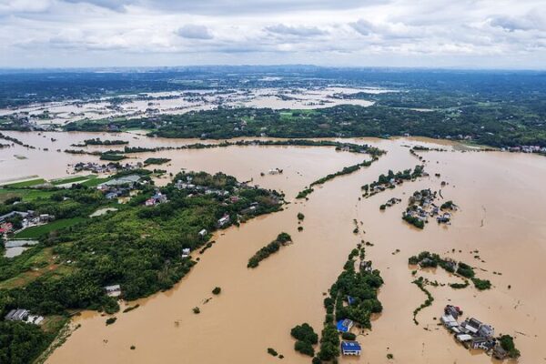 China Battles Severe Floods and Dike Breaches Amid Heavy Rainfall China_Battles_Severe_Floods_and_Dike_Breaches_Amid_Heavy_Rainfall