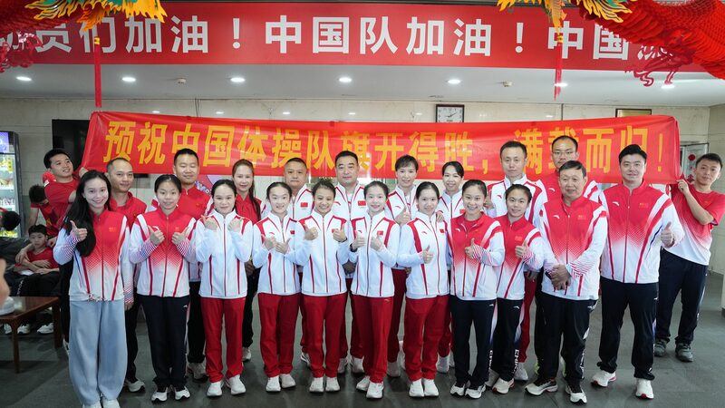 China_s_Gymnastics_Team_Arrives_at_Olympic_Village_for_Paris_Summer_Olympics - Khabar Asia China_s_Gymnastics_Team_Arrives_at_Olympic_Village_for_Paris_Summer_Olympics