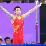 China_s_Zou_Jingyuan_Aims_to_Defend_Parallel_Bars_Gold_at_Paris_Olympics_poster - Khabar Asia China_s_Zou_Jingyuan_Aims_to_Defend_Parallel_Bars_Gold_at_Paris_Olympics video poster