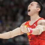 China_s_Zou_Jingyuan_Clinches_Historic_Back_to_Back_Olympic_Gold_on_Parallel_Bars