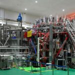 China_s__Two_Bombs_and_One_Satellite__Spirit_Fuels_Advances_in_Nuclear_and_Space_Technologies
