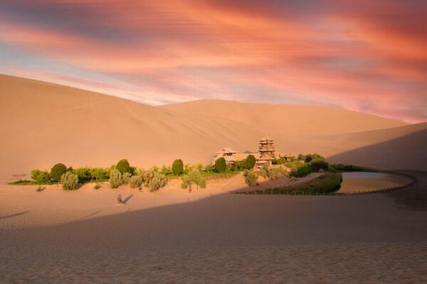 Chinas_Crescent_Lake_A_Desert_Oasis_in_Dunhuangs_Echoing-Sand_Mountain_poster - Khabar Asia China's Crescent Lake: A Desert Oasis in Dunhuang's Echoing-Sand Mountain video poster