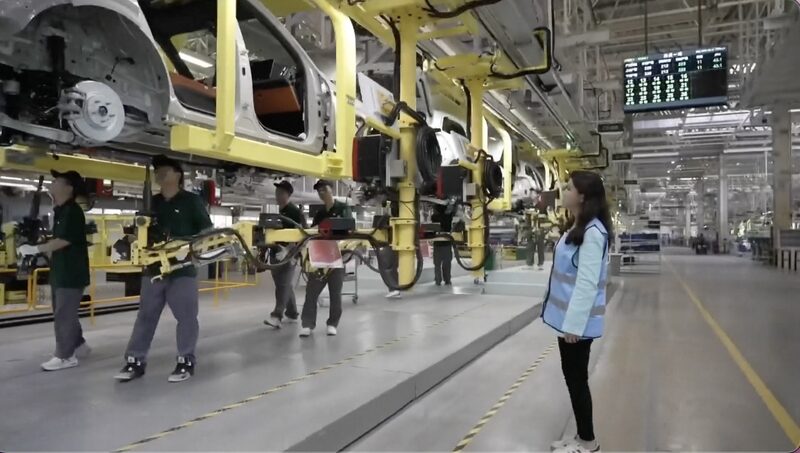 Chinas_Electric_Vehicle_Industry_Sets_Global_Standards_Amid_Tariff_Tensions_poster - Khabar Asia China's Electric Vehicle Industry Sets Global Standards Amid Tariff Tensions video poster