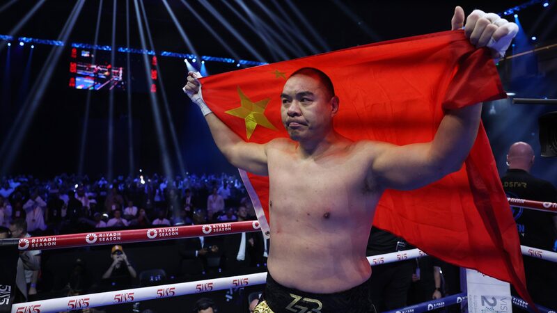 Chinese_Boxer_Zhang_Zhilei_Embraces_Chinese_Power_After_Knockout_Victory_poster - Khabar Asia Chinese Boxer Zhang Zhilei Embraces 'Chinese Power' After Knockout Victory video poster