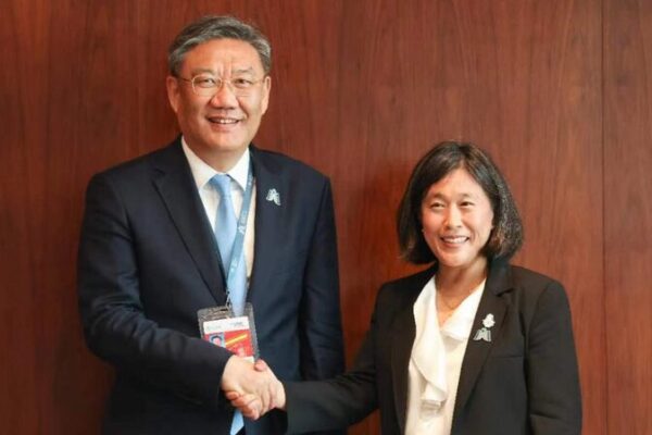 Chinese Commerce Minister Wang Wentao Meets U.S. Trade Representative at WTO Conference Chinese Commerce Minister Wang Wentao Meets U.S. Trade Representative at WTO Conference