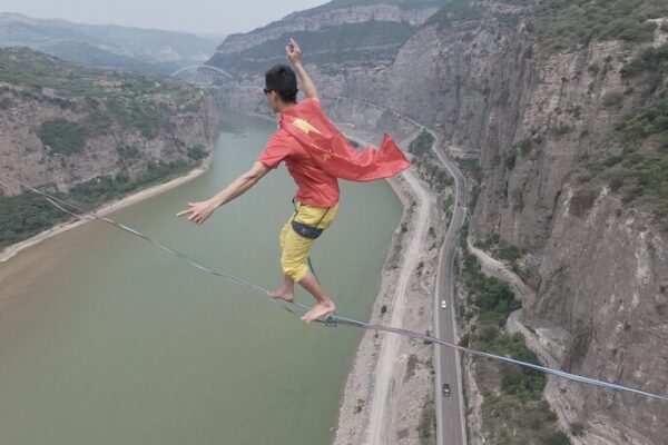 Chinese Slackliner Attempts Record-Breaking 600-Meter Yellow River Crossing Chinese Slackliner Attempts Record-Breaking 600-Meter Yellow River Crossing video poster