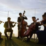 Chinese and U.S. Musicians Unite in Song to Support COVID-19 Fight video poster