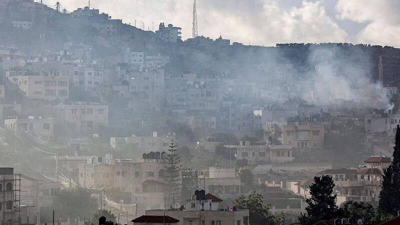 Conflict_Escalates_Over_18000_Palestinians_Killed_Amid_Renewed_Gaza_Bombardments_poster - Khabar Asia Conflict Escalates: Over 18,000 Palestinians Killed Amid Renewed Gaza Bombardments video poster