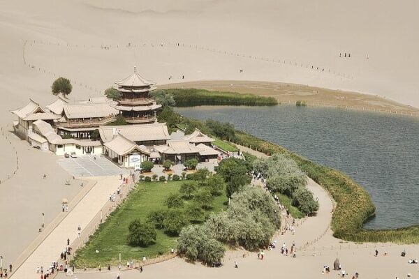Crescent_Lake_Dunhuangs_Desert_Oasis_Defies_Natures_Odds_poster - Khabar Asia Crescent Lake: Dunhuang's Desert Oasis Defies Nature's Odds video poster