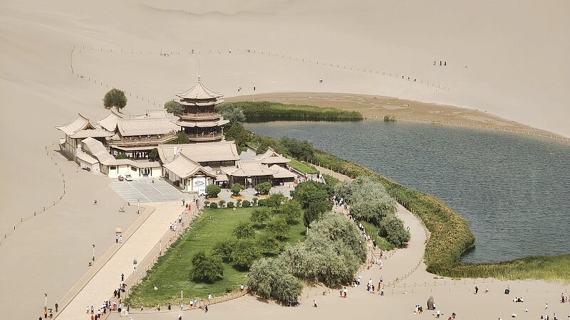 Crescent_Lake_Dunhuangs_Desert_Oasis_Defies_Natures_Odds_poster - Khabar Asia Crescent Lake: Dunhuang's Desert Oasis Defies Nature's Odds video poster
