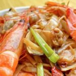Discover Hainan's Seafood Fried Rice Noodles: A Culinary Gem Awaiting Travelers
