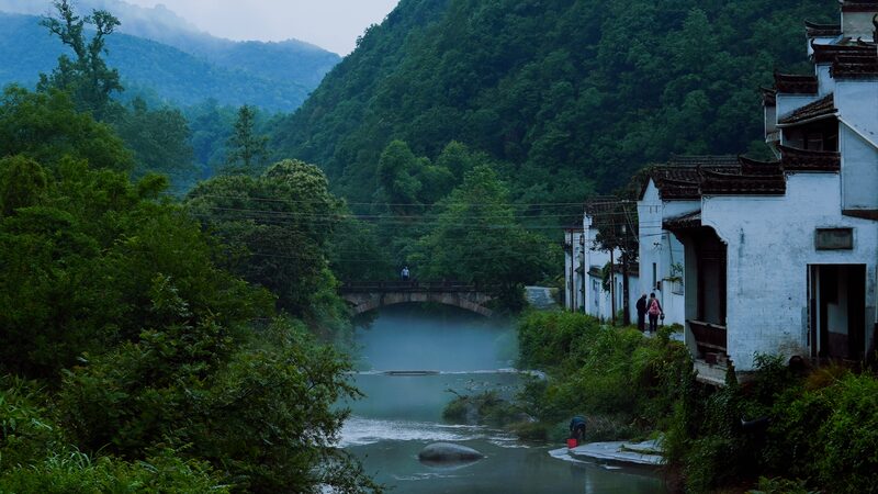 Discover Tranquility in Anhui's Lixi Village: A Hidden Gem Amidst Majestic Mountains