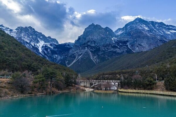 Discover the Majestic Blue Moon Valley at Yulong Snow Mountain During the Dragon Boat Festival video poster