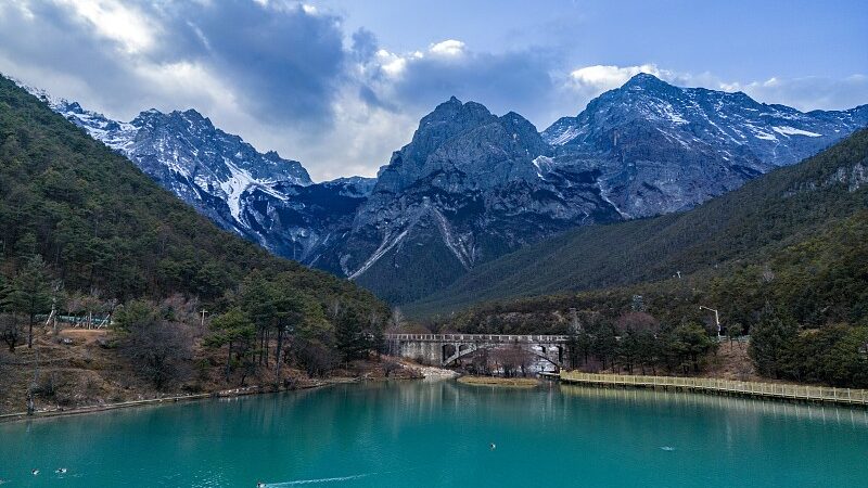 Discover_the_Majestic_Blue_Moon_Valley_at_Yulong_Snow_Mountain_During_the_Dragon_Boat_Festival_poster - Khabar Asia Discover the Majestic Blue Moon Valley at Yulong Snow Mountain During the Dragon Boat Festival video poster