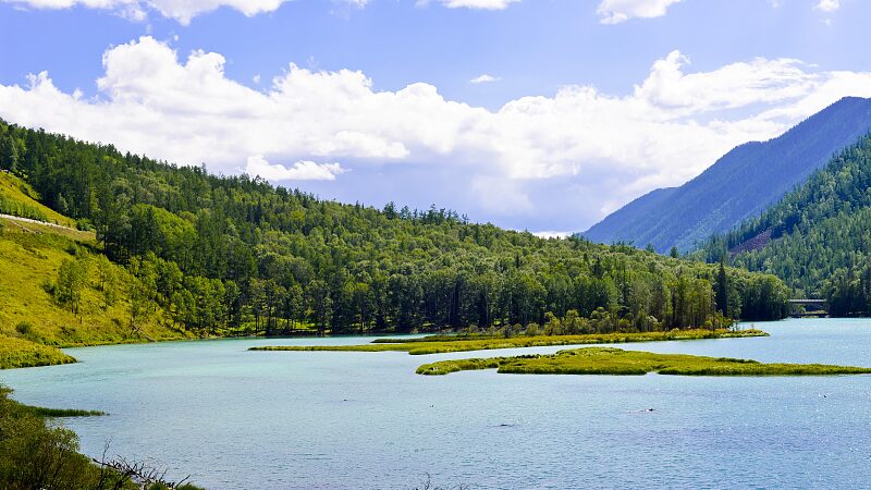 Discover_the_Majestic_Wolong_Bay_in_Xinjiangs_Kanas_Scenic_Area_poster-1 - Khabar Asia Discover the Majestic Wolong Bay in Xinjiang's Kanas Scenic Area video poster