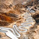 Dizzying Panlong Ancient Road Winds Through Xinjiang's Pamir Plateau