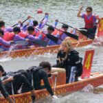 Dragon Boat Teams Race Down Nanjing's Qinhuai River in Vibrant Summer Spectacle