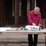 Echoes_of_the_Sea__The_Ancient_Art_of_Fish_Rubbing_in_Xiangshan