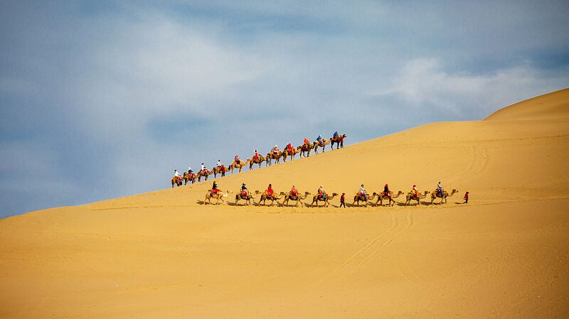 Echoing_Sands_and_Camel_Rides_Exploring_Mingsha_Mountain_in_Dunhuang_poster - Khabar Asia Echoing Sands and Camel Rides: Exploring Mingsha Mountain in Dunhuang video poster
