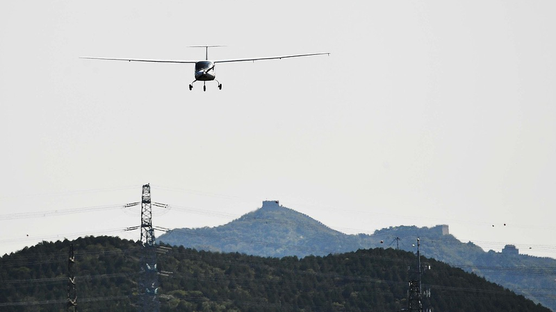 Electric_Aircraft_Makes_First_Flight_Near_Beijing_s_Badaling_Great_Wall