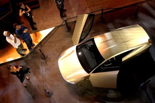 Elon_Musk_Unveils_Two_Door_Robotaxi__Production_Set_for_2026