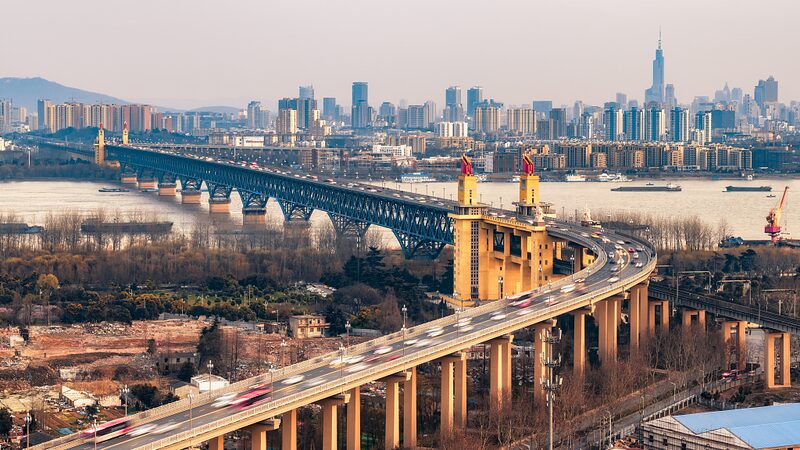 Exploring_Chinas_Iconic_Nanjing_Yangtze_River_Bridge_A_Milestone_in_Engineering_poster - Khabar Asia Exploring China's Iconic Nanjing Yangtze River Bridge: A Milestone in Engineering video poster