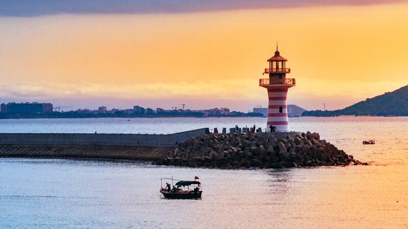 Exploring_Qingshui_Bay_Hainans_Crystal_Clear_Waters_and_Singing_Beaches - Khabar Asia Exploring Qingshui Bay: Hainan's Crystal Clear Waters and "Singing Beaches"