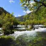 Exploring the Enchanting Lakes and Waterfalls of Shuzheng Valley in Jiuzhaigou video poster