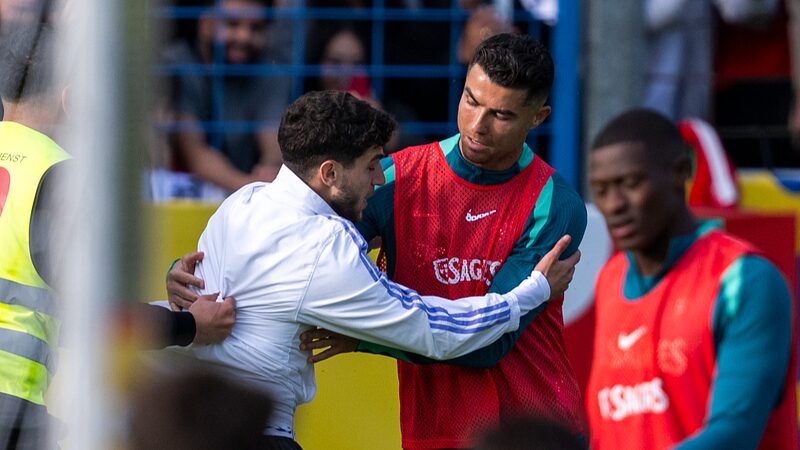 Fan_Invades_Pitch_to_Snap_Selfie_with_Cristiano_Ronaldo_Ahead_of_Euro_2024 - Khabar Asia Fan Invades Pitch to Snap Selfie with Cristiano Ronaldo Ahead of Euro 2024