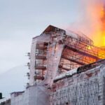 Fire Engulfs Copenhagen's Historic Old Stock Exchange, Spire Collapses video poster