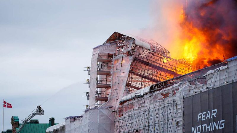 Fire_Engulfs_Copenhagens_Historic_Old_Stock_Exchange_Spire_Collapses_poster - Khabar Asia Fire Engulfs Copenhagen's Historic Old Stock Exchange, Spire Collapses video poster
