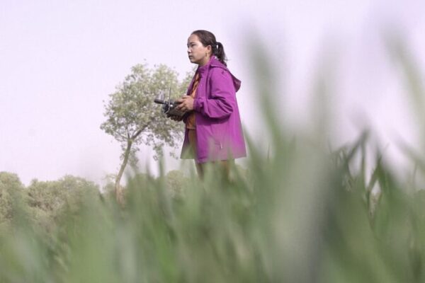 First Female Drone Pilot Transforms Agriculture in Xinjiang Village video poster