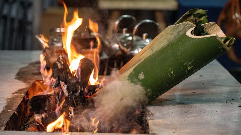 Flaming_Bamboo-Tube_Chicken_Rice_Yunnans_Ancient_Culinary_Artistry - Khabar Asia Flaming Bamboo-Tube Chicken Rice: Yunnan's Ancient Culinary Artistry