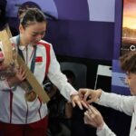 From_Gold_to_Diamonds__Chinese_Badminton_Duo_s_Unforgettable_Moment_at_Paris_Olympics