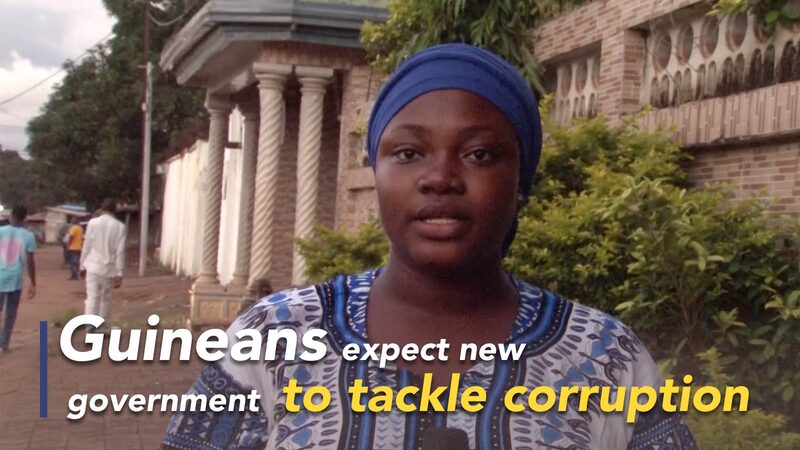 Guineans_Hope_New_Government_Will_Fight_Corruption_After_Coup_poster - Khabar Asia Guineans Hope New Government Will Fight Corruption After Coup video poster