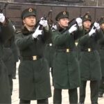 Gun_Salutes_Honor_Fallen_CPV_Heroes_as_Remains_Buried_in_Shenyang video poster