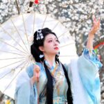 Hanfu Revival Blooms Among Young Chinese Amid Spring Blossoms