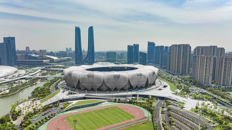Hangzhous_Olympic_Sports_Center_The_Epicenter_of_the_19th_Asian_Games_poster - Khabar Asia Hangzhou's Olympic Sports Center: The Epicenter of the 19th Asian Games video poster