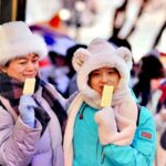 Harbin_s_Icy_Delight__Enjoying_Popsicles_on_a_Snowy_Central_Street